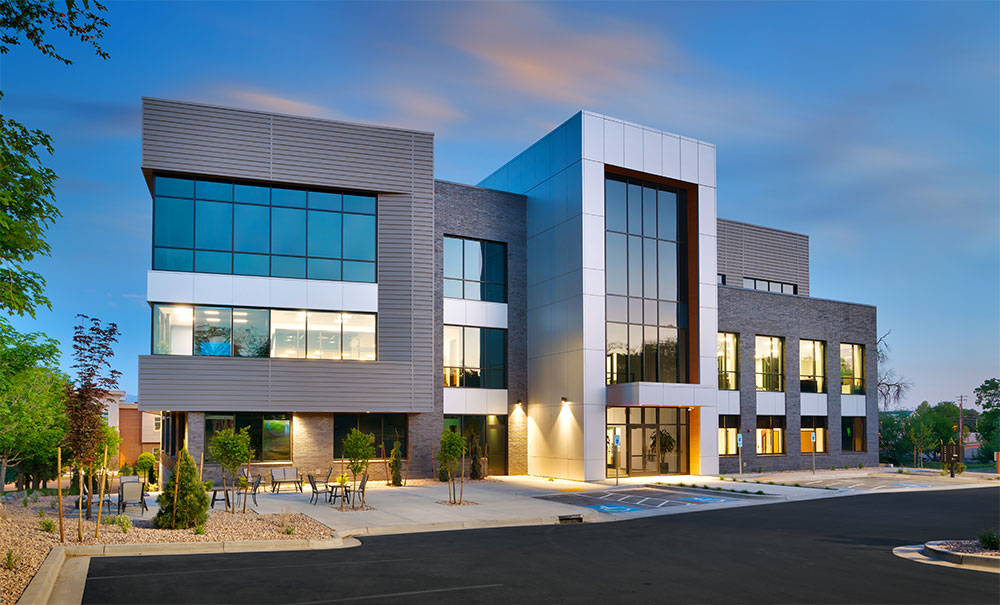 What types of buildings do commercial architects design?